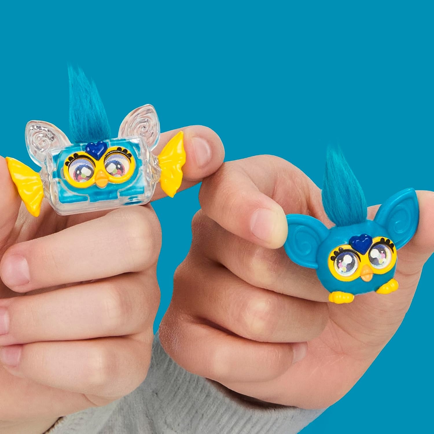 image:imageFurby Minis 12 Pack of The Hershey Company Figures Tiny Collectible 1Inch Candy Toys Halloween Handouts for Kids Ages 6 Amazon Exclusive